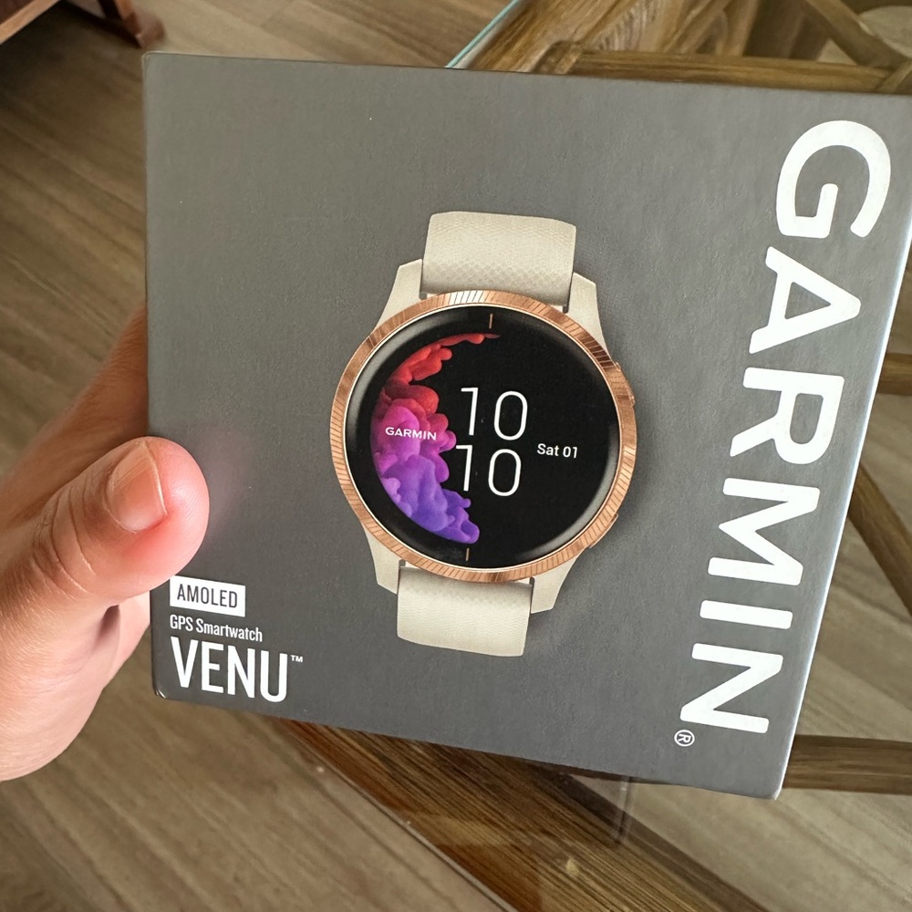 Garmin Venu Smartwatch - Cream Band with Gold Bezel